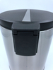 black waste bin with lid